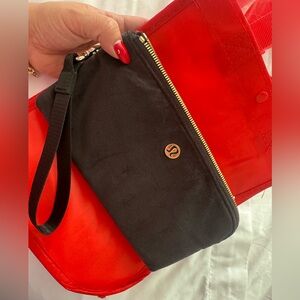 Lululemon Athletica Black and Gold Wristlet
